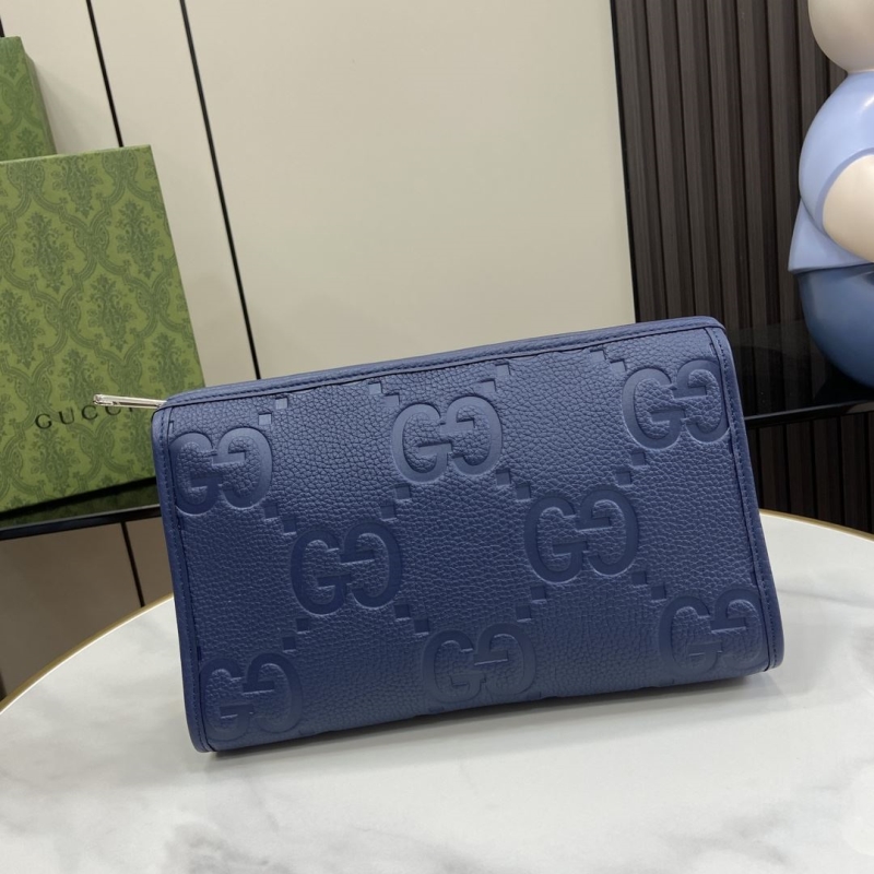G*u*i clutch bags